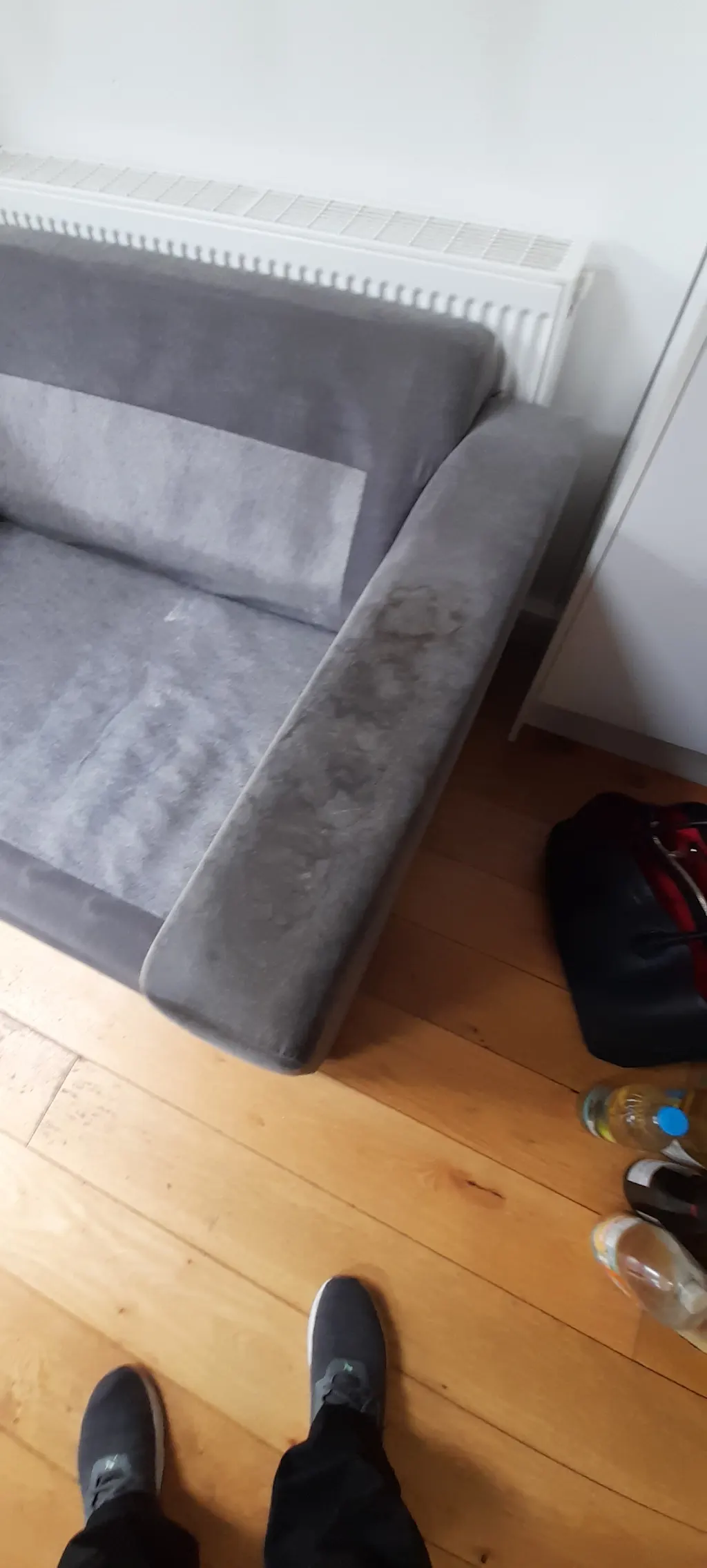 Sofa before upholstery cleaning with visible wear in Stoneleigh Surrey